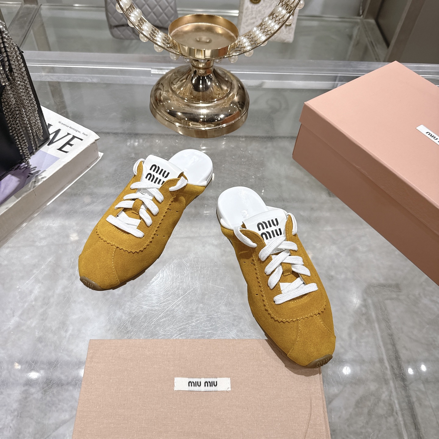 Miu Miu 25SS Leather Mules with Adjustable Straps and Rubber Sole 4 i1746688037989 3070 0 1