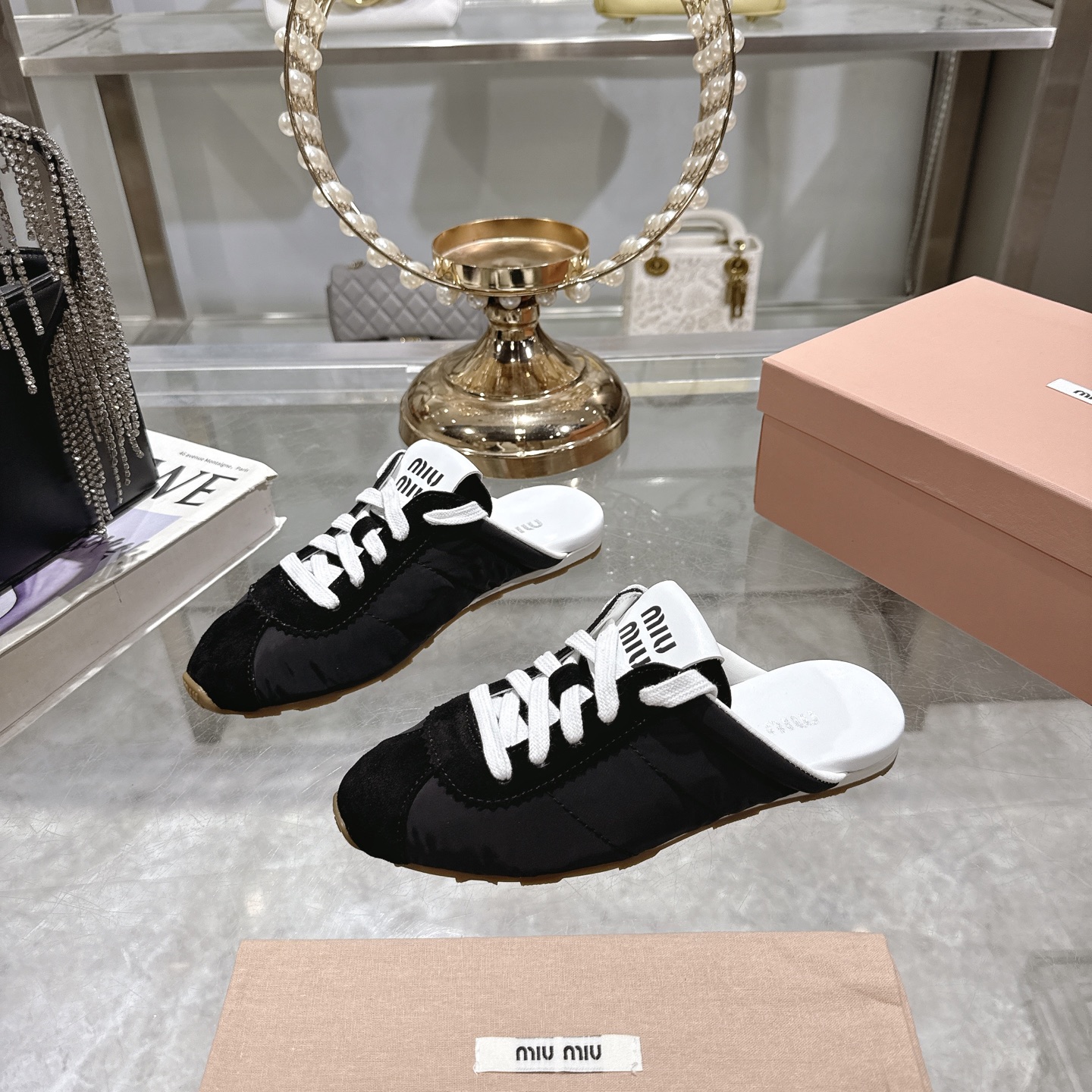 Miu Miu Spring Leather Mules with Adjustable Straps and Logo Detail 2 i1746688537569 5224 0 2