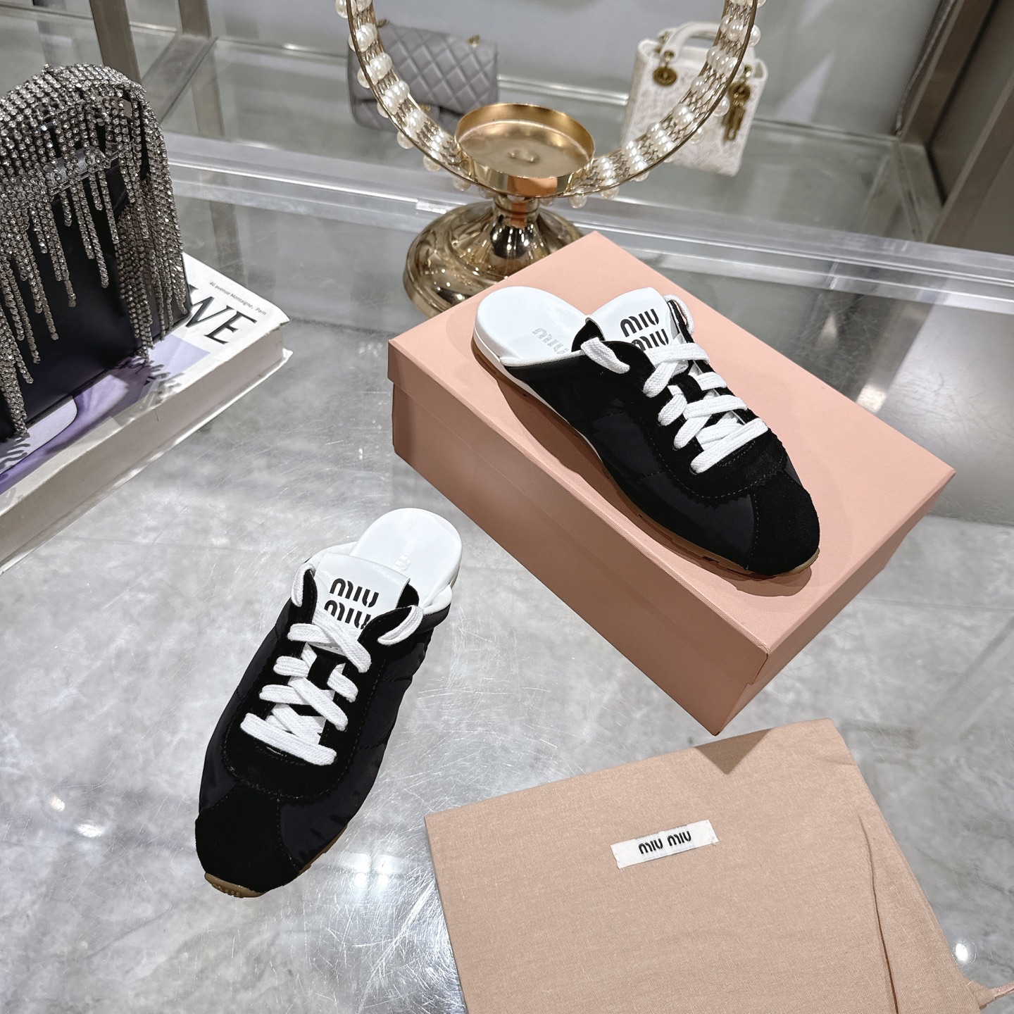 Miu Miu Spring Leather Mules with Adjustable Straps and Logo Detail 7 i1746688542523 9834 0 5