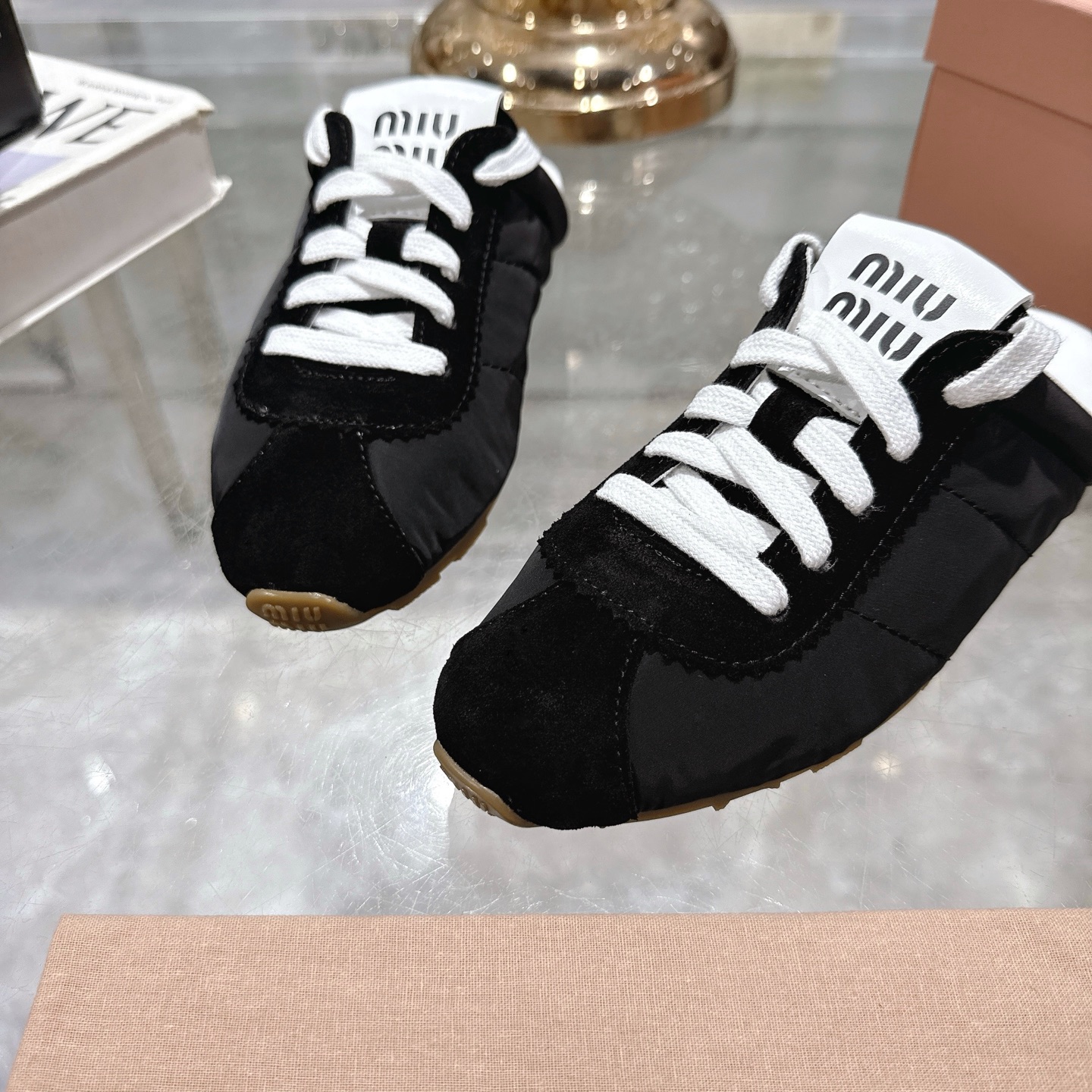 Miu Miu Spring Leather Mules with Adjustable Straps and Logo Detail 9 i1746688544138 9616 0 7