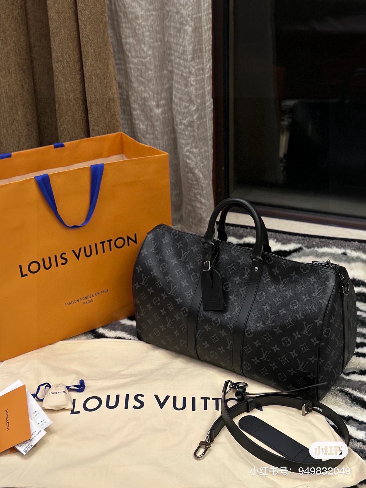 lv keepall guerriero nero