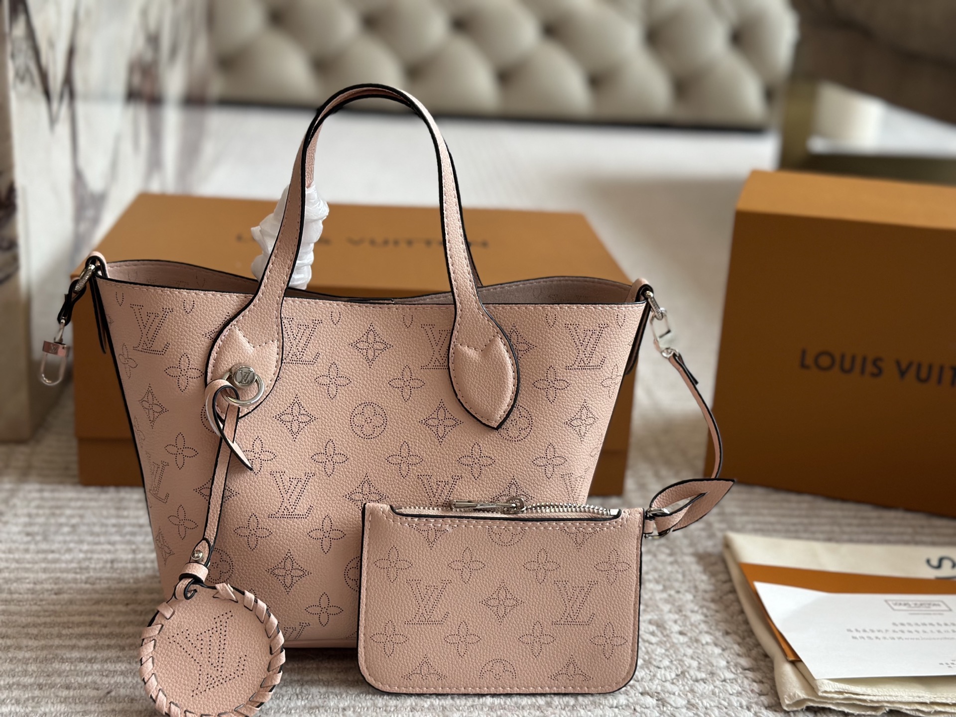 LV bucket deformation handbag perforated cow leather detachable shoulder strap for hand and crossbody