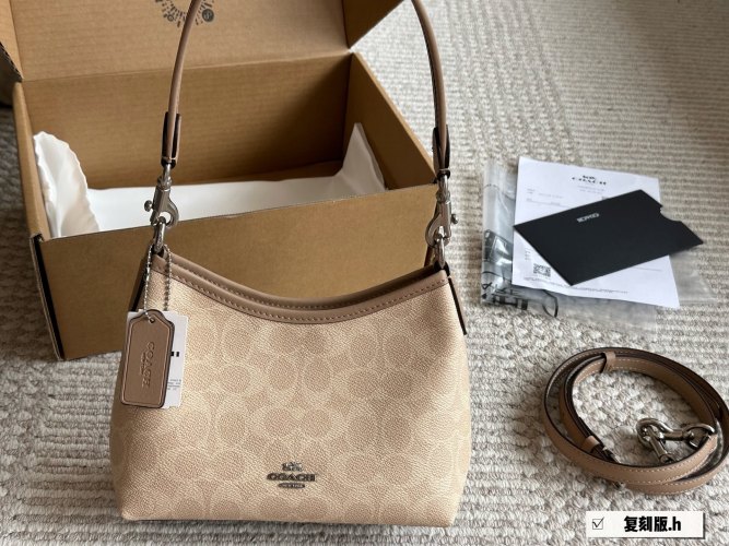Coach Bolso Bandolera Wander Mini en Lona Estampada Signature 1 Coach Bolso Bandolera Wander Mini en Lona Estampada Signature