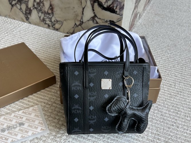 MCM Mini Basket Tote Bag with Dog Charm - Stylish and Functional 1 MCM Mini Basket Tote Bag with Dog Charm – Stylish and Functional