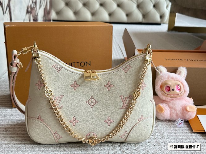 Louis Vuitton Cream White Monogram Embossed Leather Baguette 1 Louis Vuitton Cream White Monogram Embossed Leather Baguette