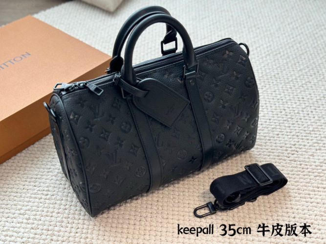 Louis Vuitton Keepall 35 Black Leather Travel Duffle Bag with Strap 1 Louis Vuitton Keepall 35 Black Leather Travel Duffle Bag with Strap