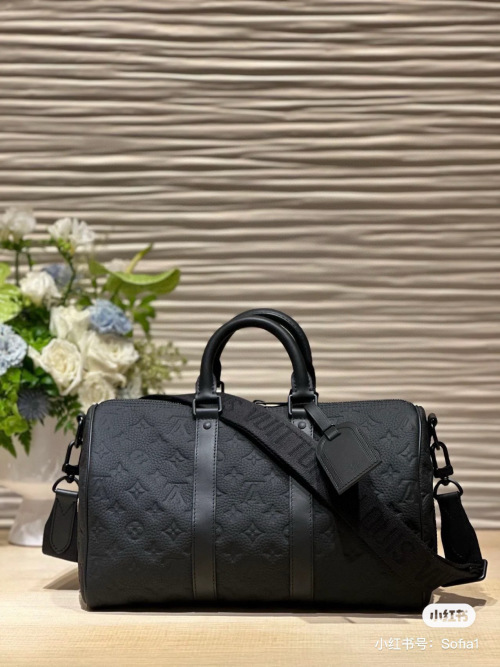 Louis Vuitton Keepall: Stylish Black Leather Travel Bag for Men and Women 1 Louis Vuitton Keepall: Stylish Black Leather Travel Bag for Men and Women