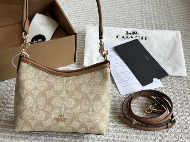 Coach Mini Baguette Bag in Signature Canvas - Stylish and Compact 1 Coach Mini Baguette Bag in Signature Canvas - Stylish and Compact