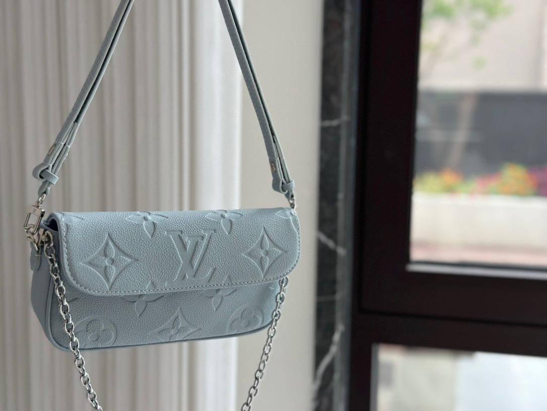 Louis Vuitton Blue Ivy WOC Handbag, Crossbody Bag, and Shoulder Bag
