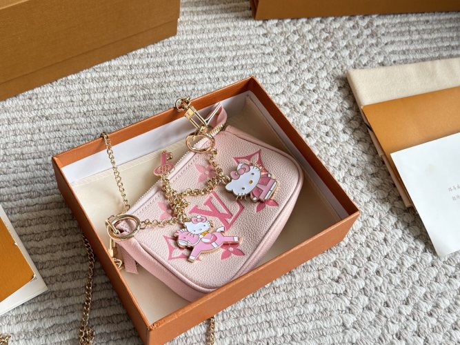 Louis Vuitton Pink Monogram Chain Pouch with Hello Kitty Charms 1 Louis Vuitton Pink Monogram Chain Pouch with Hello Kitty Charms