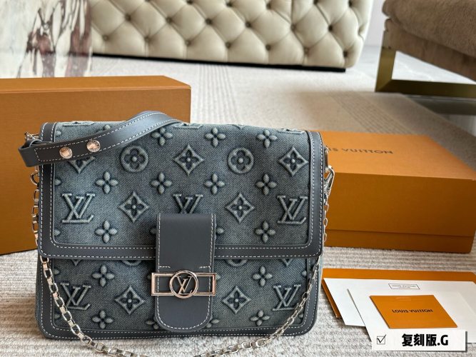 Louis Vuitton Dauphine Soft Bag Monogram Denim with Leather Trim, 30 x 21 cm 1 Louis Vuitton Dauphine Soft Bag Monogram Denim with Leather Trim, 30 x 21 cm