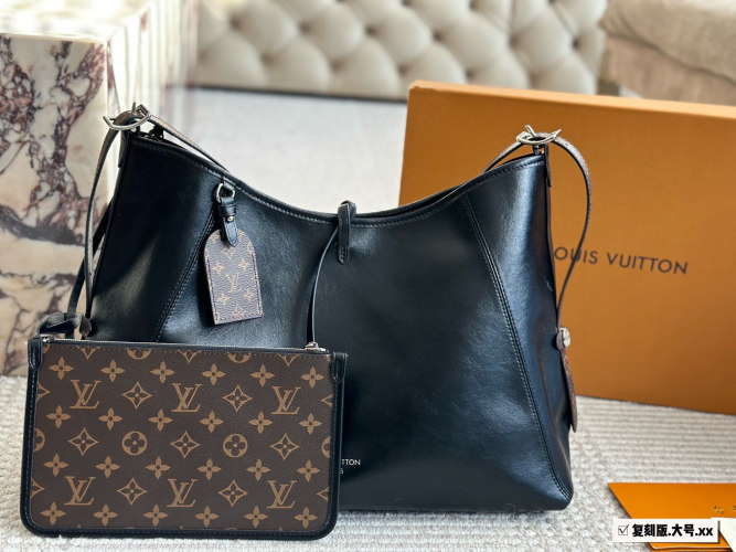 Louis Vuitton Carryall Dark Medium Handbag - Black Leather, Spacious & Stylish 1 Louis Vuitton Carryall Dark Medium Handbag - Black Leather, Spacious & Stylish
