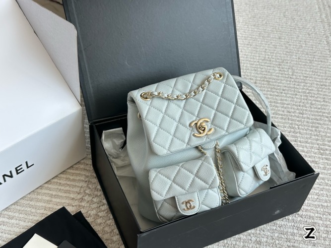 Chanel Duma Backpack: Chic Quilted Leather with Twin Pockets - Light Blue 1 Chanel Duma Backpack: Chic Quilted Leather with Twin Pockets - Light Blue