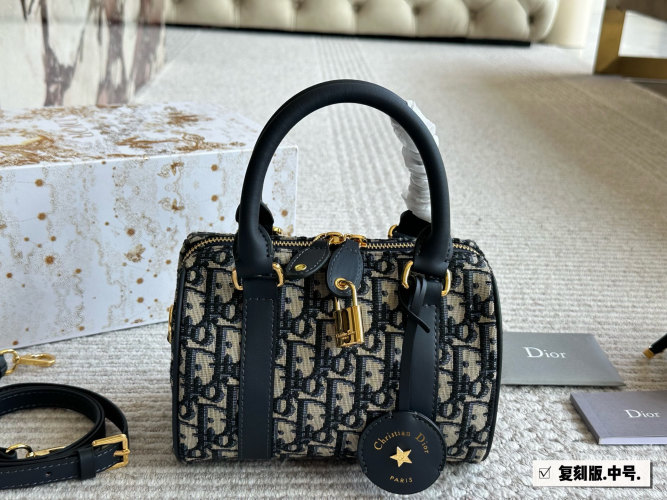 Dior Groove Boston Handbag: A Timeless Icon with Signature Fabric and Leather Trim 1 Dior Groove Boston Handbag: A Timeless Icon with Signature Fabric and Leather Trim