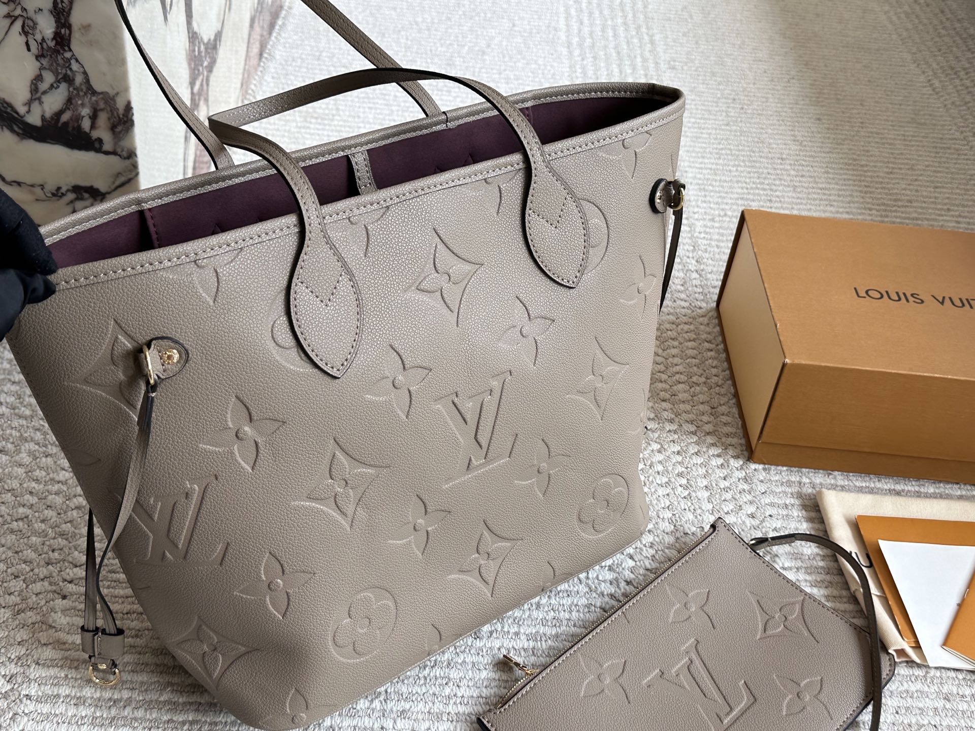 Louis Vuitton Neverfull Bolso Tote Empreinte Cuero con Estuche Desmontable 6 i1757752306532 5173 0 4