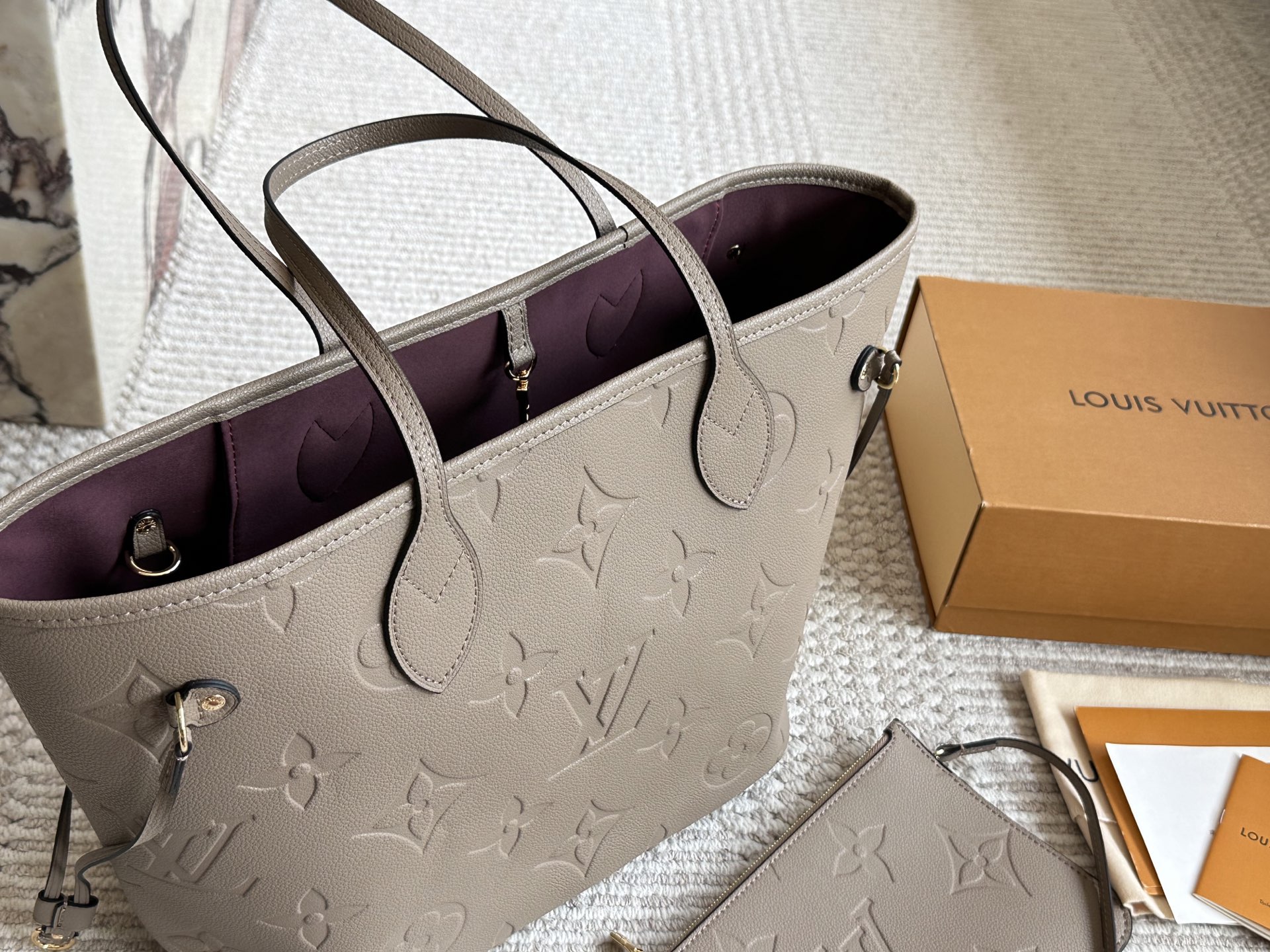 Louis Vuitton Neverfull Bolso Tote Empreinte Cuero con Estuche Desmontable 5 i1757752306669 4496 0 3