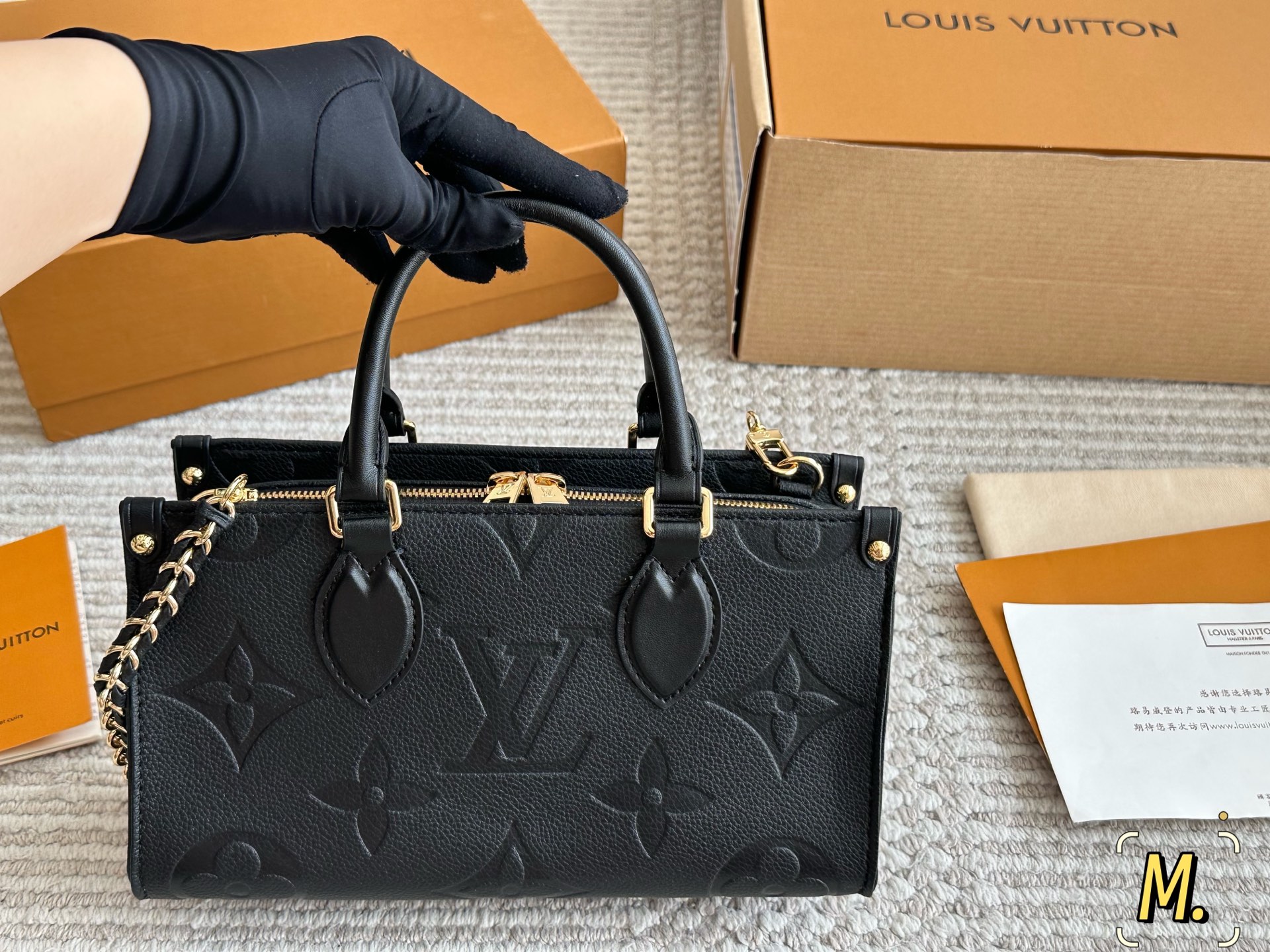 Louis Vuitton OnTheGo East West Bolso de Mano en Cuero Empreinte Negro 5 i1757933474041 8568 0 3