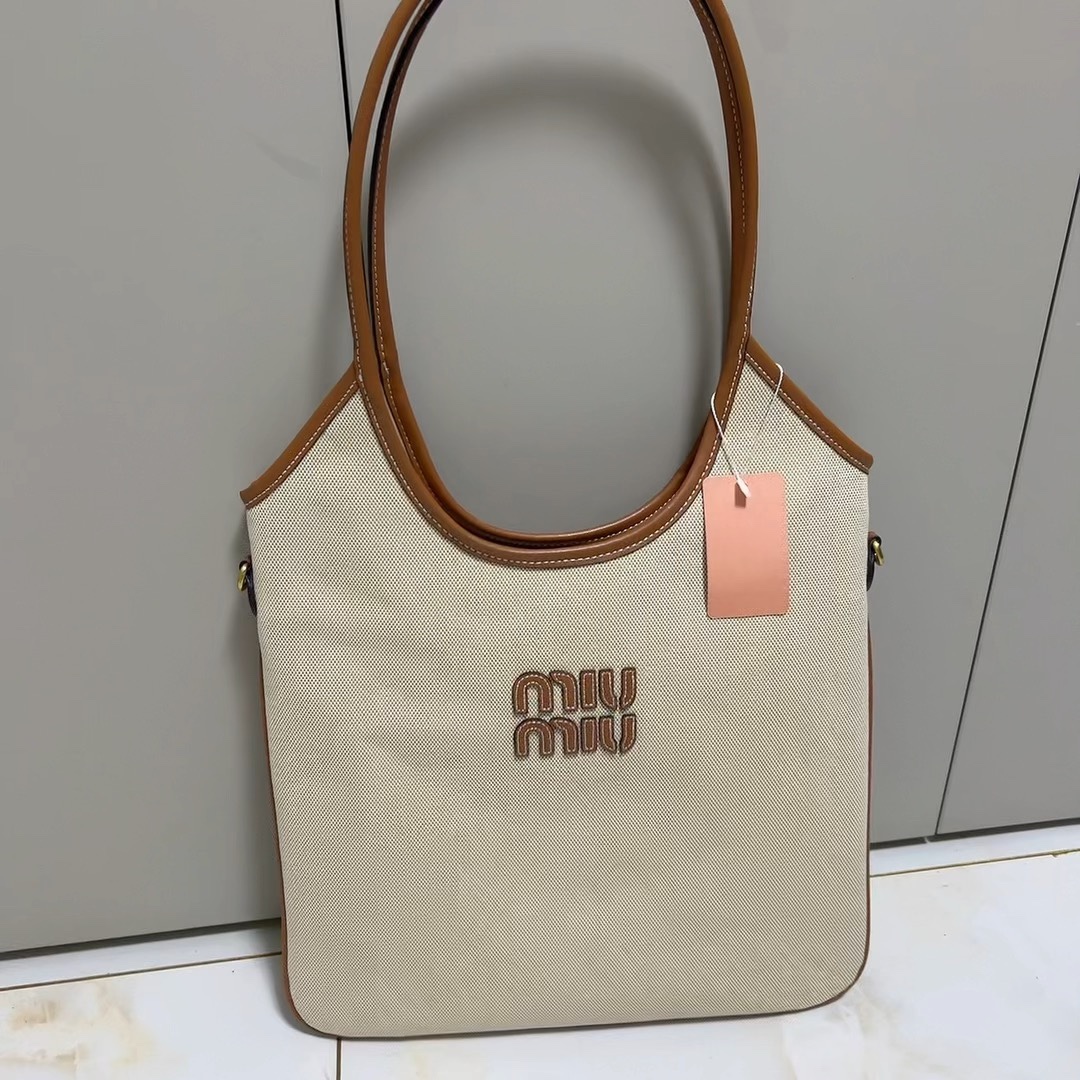 Miu Miu Vertical Canvas Tote Bag - Comprehensive