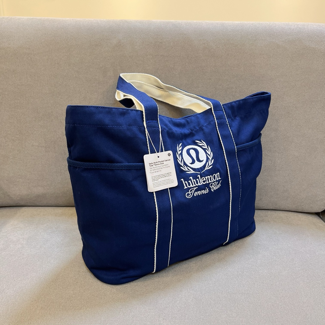 A refined, minimalist tote bag designed with a supple yet structured - Comprehensive 2