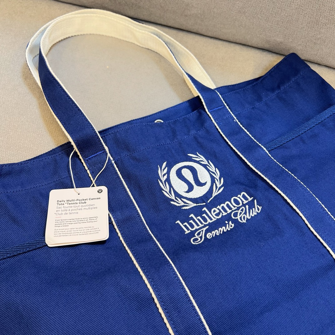 A refined, minimalist tote bag designed with a supple yet structured - Comprehensive 6