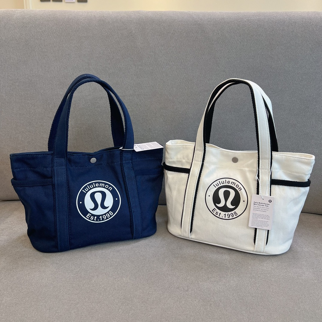 this mini handbag features a wide opening for easy access to all - Comprehensive