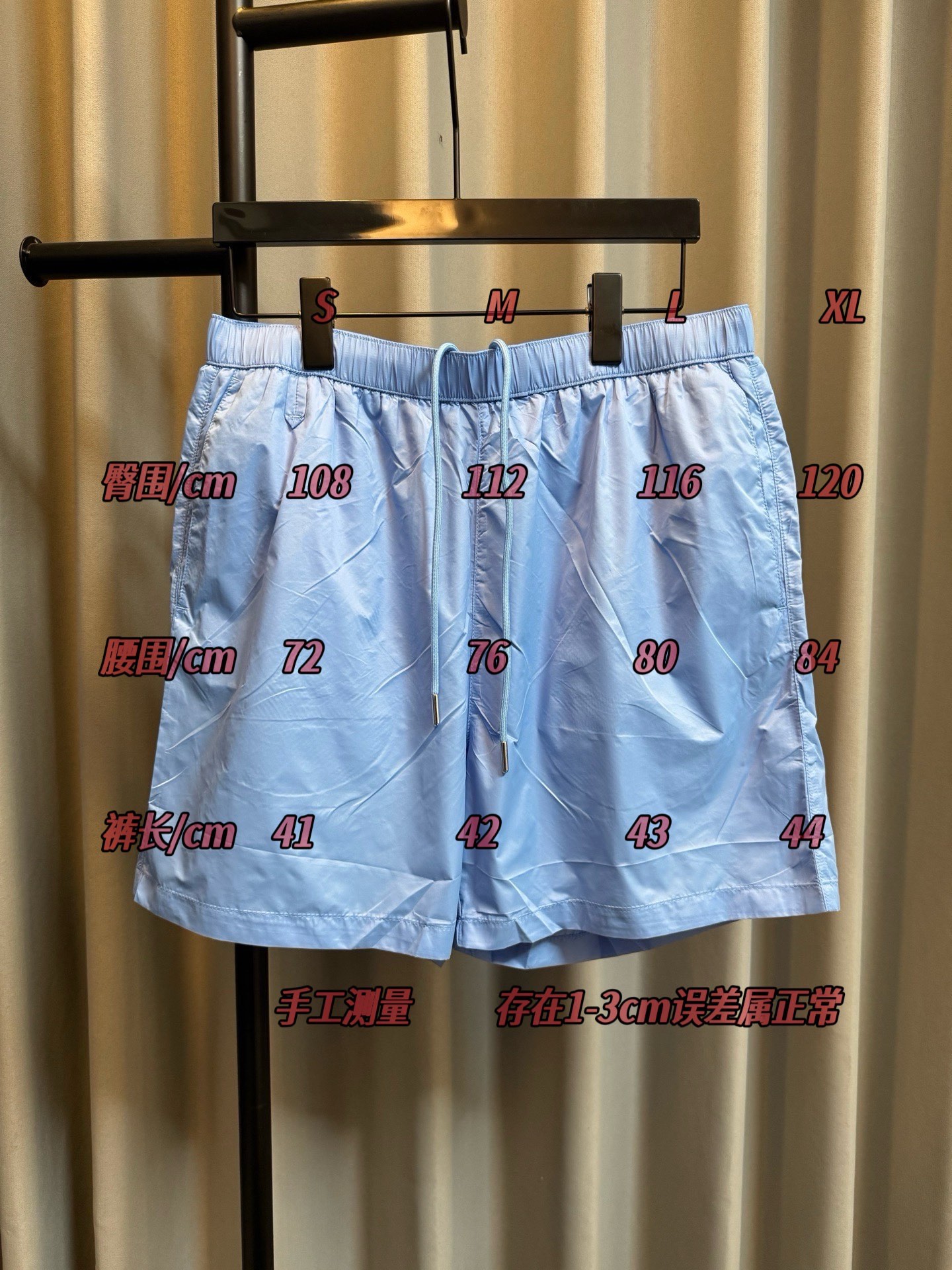 /Tabla de tallas Prada/Prada 26Ss Re-Nylon pantalones cortos con cremallera metálica y logo triangular (azul)