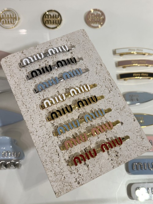 Miu Miu Enamel Logo Hair Clip - Stylish Accessory in Multiple Colors 1 Miu Miu Enamel Logo Hair Clip - Stylish Accessory in Multiple Colors