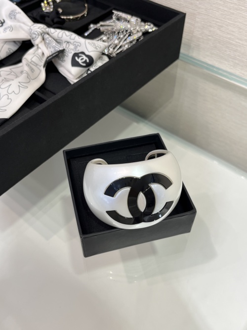 Chanel 25P Black & White Wide Cuff Bracelet with CC Logo and Pearl Accents 1 Chanel 25P Black & White Wide Cuff Bracelet with CC Logo and Pearl Accents