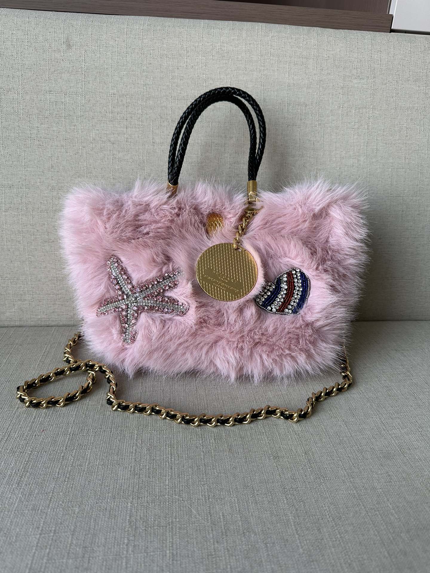 alexanderwang is a collaboration between Alexander Wang and Bulgari! 100% authentic! 100% imported animal fur (fox fur)! The inside is all leathe