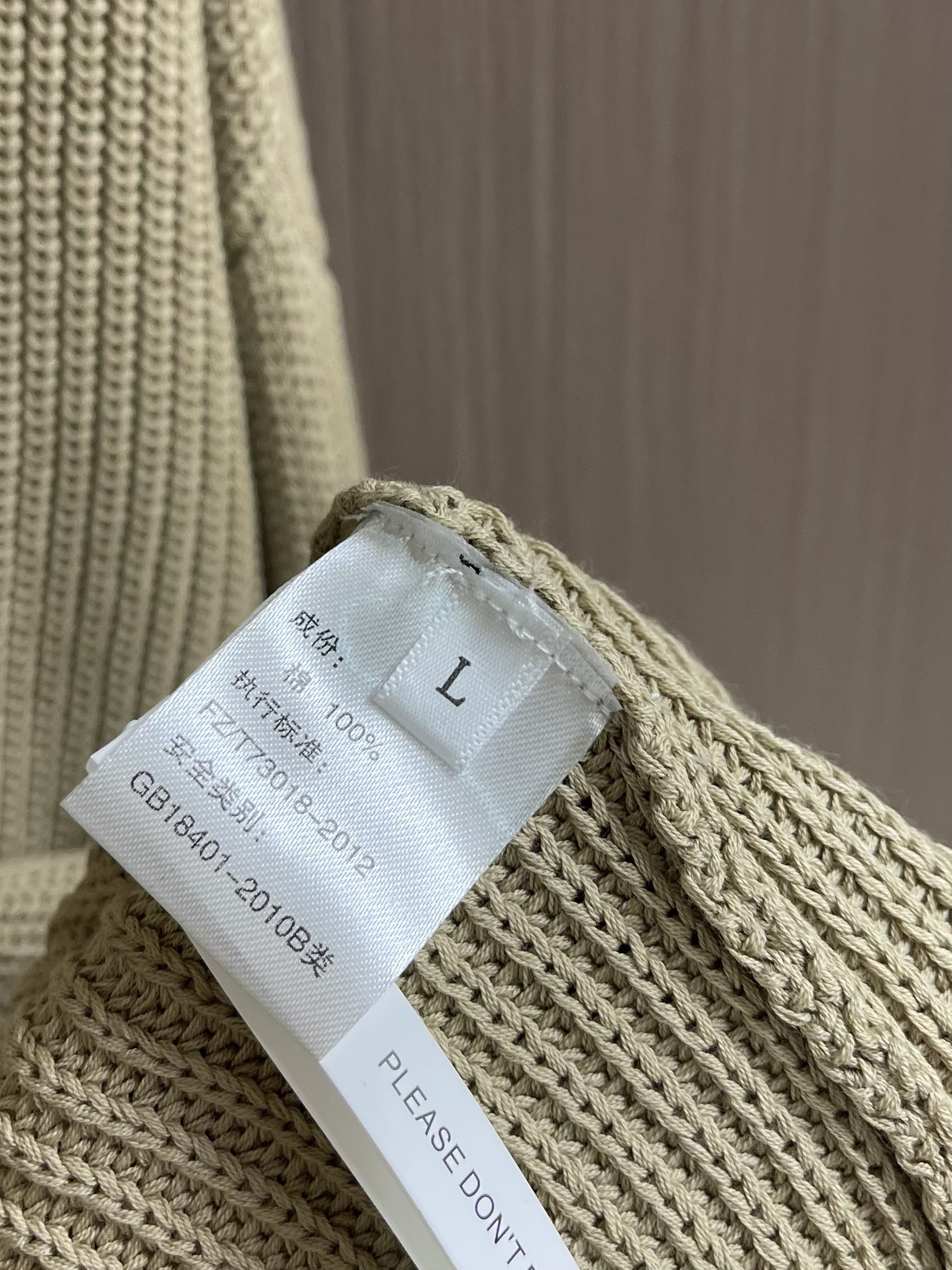 Luxurious Loro Piana Henry’s Tie Button Sweater: High-Quality Cotton, German Craftsmanship, and Eco-Friendly Nanowater Washing - 图片 6