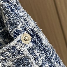 Dior 蓝色全幅老花提花短裤,这款短裤通过乔纳森·安德森 (Jonathan Anderson) 的现 Dior 蓝色全幅老花提花短裤,这款短裤通过乔纳森·安德森 (Jonathan Anderson) 的现