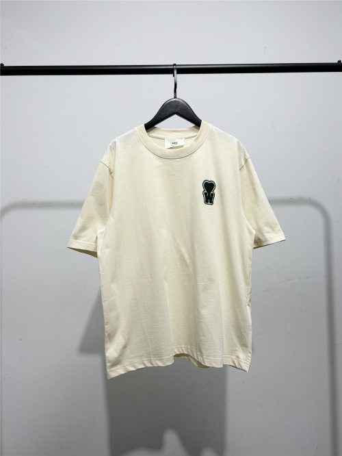 AMI x WOO SHIK Cotton T-Shirt with Embroidered Heart Logo in Beige 1 AMI x WOO SHIK Cotton T-Shirt with Embroidered Heart Logo in Beige