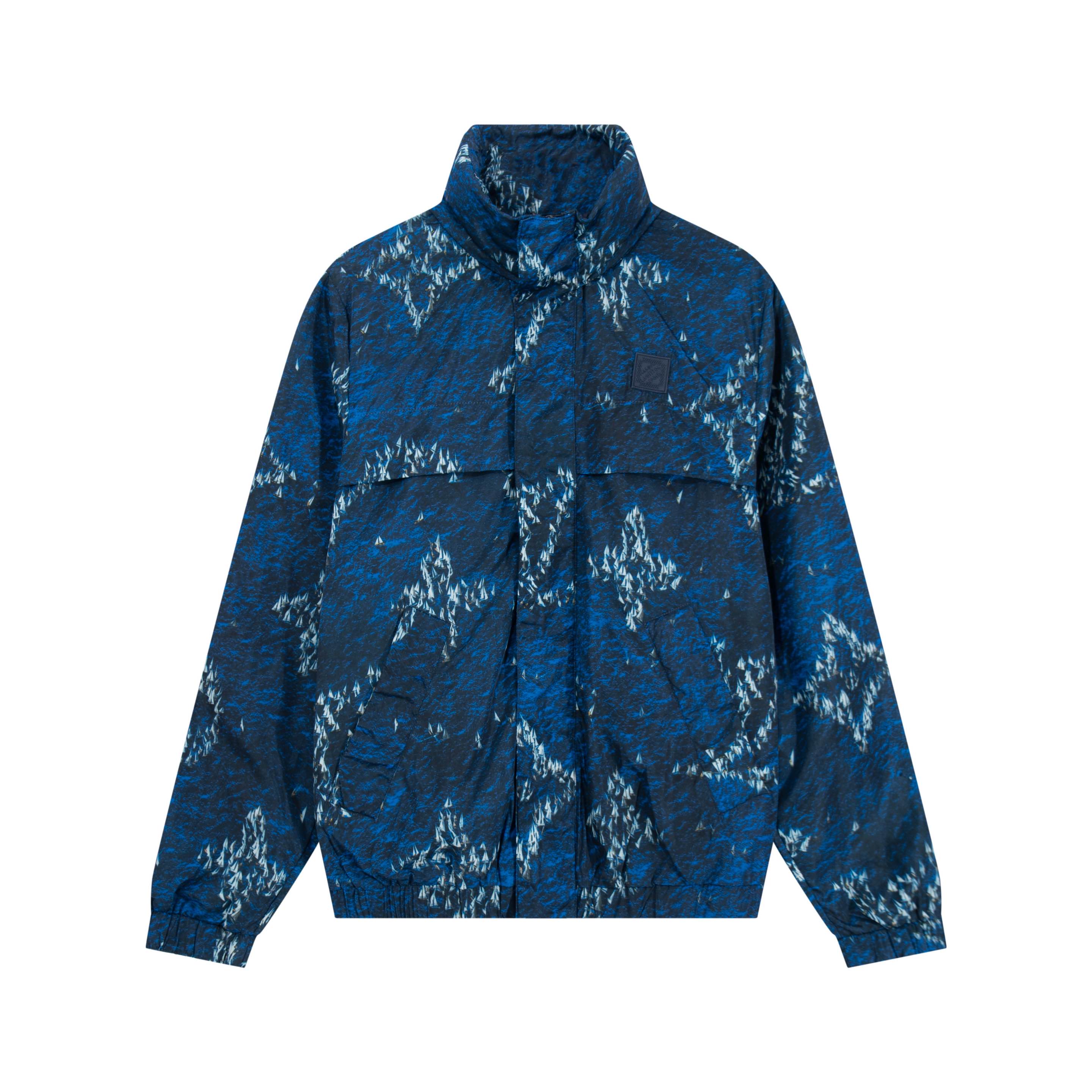 Cazadora cortavientos con capucha P210 1v 25Fw de nailon con estampado de veleros en color azul oscuro. El diseño de im…