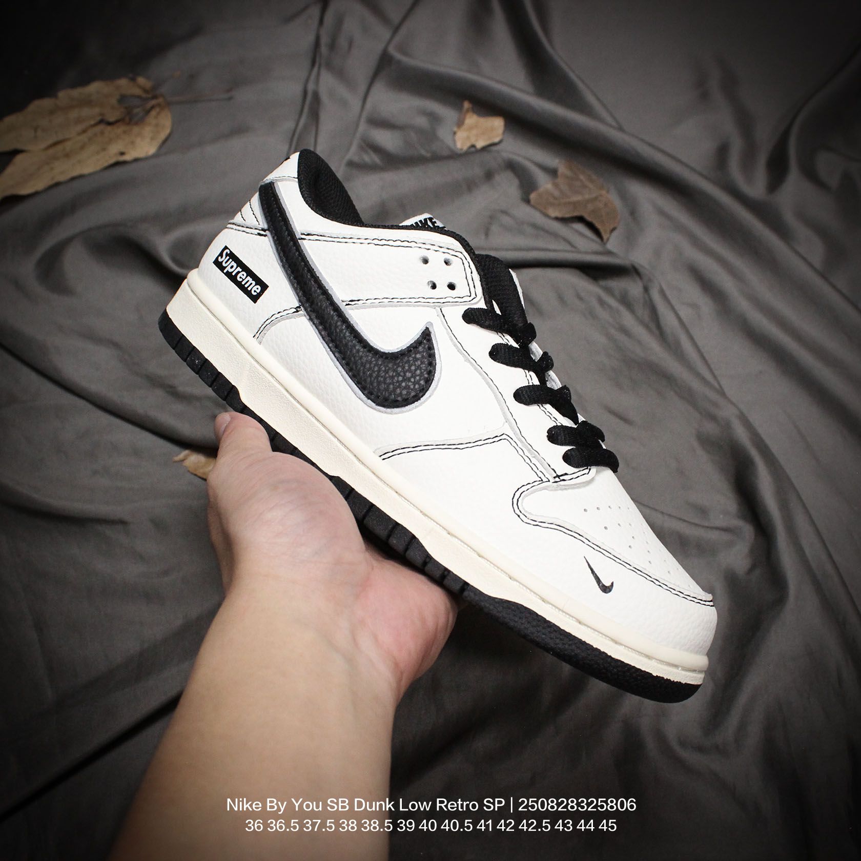 💰110
Nike/耐克 男女鞋真标半码制，全新更新数据窄楦翘头版型，采用荔枝纹牛剖革组合猪巴革鞋面材质，缜密拉帮中底布，鞋垫嵌EVA缓震物料及背胶，全新窄版翘头耐磨橡胶大底❗️创意定制联名配色,经典美系街头品牌-至高无上Supreme x Nike By You SB Dunk Low Retro SP扣篮系列低帮休闲运动滑板板鞋“ 

类型：男女鞋
码数：36 36.5 37.5 38 38.5 39 40 40.5 41 42 42.5 43 44 45
编码：250828325.806