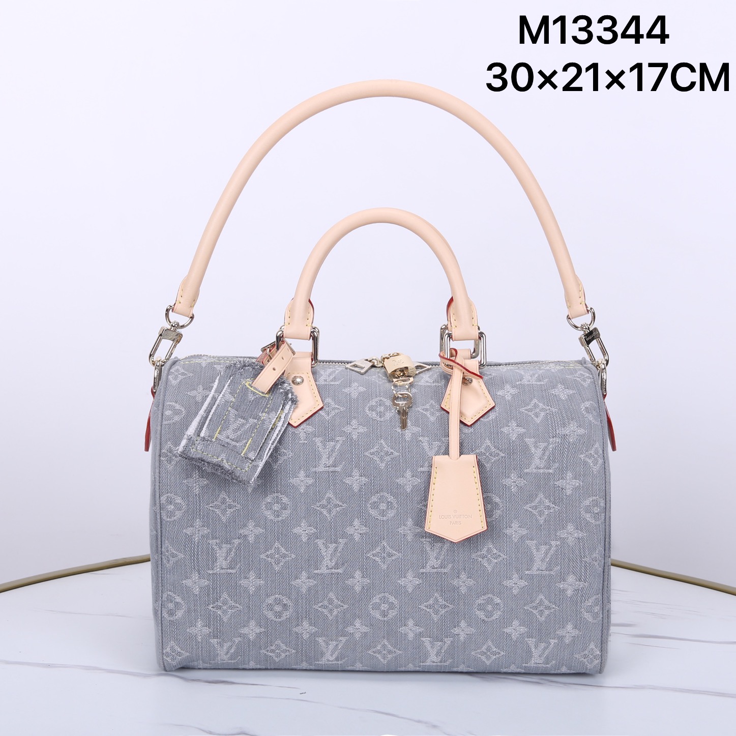 Louis Vuitton Speedy Soft 30: Monogram Denim, Leather Trim, and Metal Accents 2 i1747028349161 7921 0 0