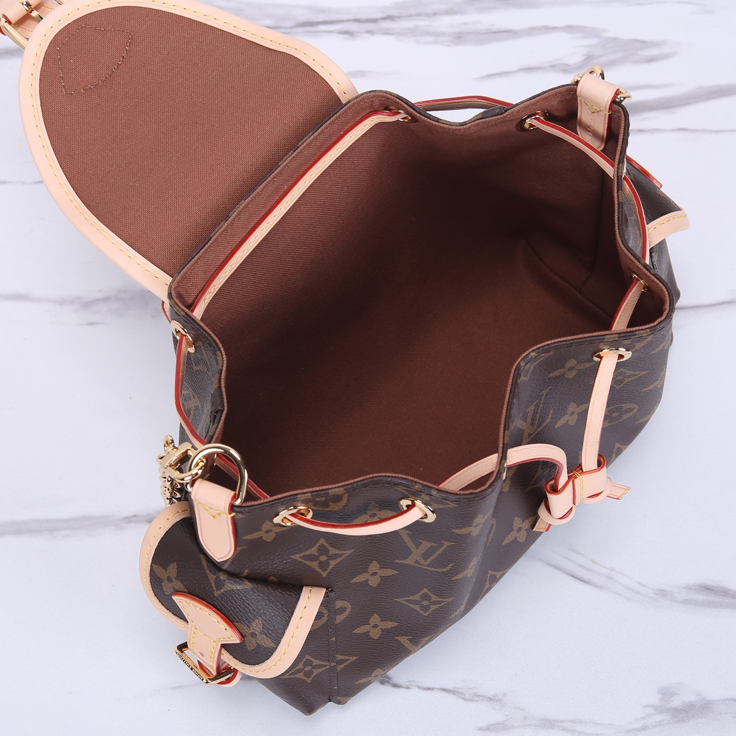 Louis Vuitton Odysée Monogram Canvas Bag, 27 cm - Stylish & Functional 6 i1747388098348 3331 0 4