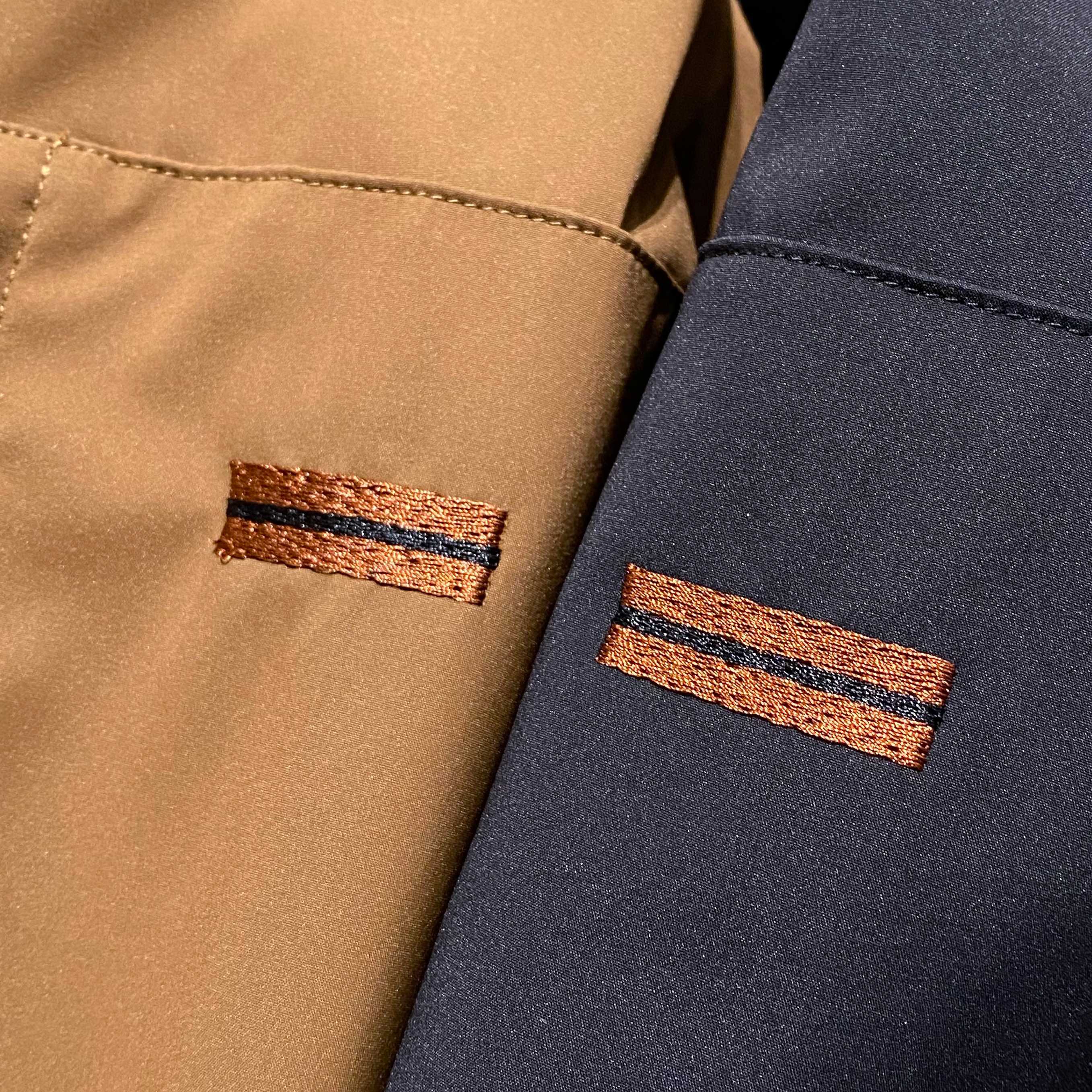 【御寒亦需型格｜EZ家多功能夹棉夹克细节鉴赏】从刺绣字体的倾斜角度到魔术贴的阻尼质感，这件夹克将杰尼亚对