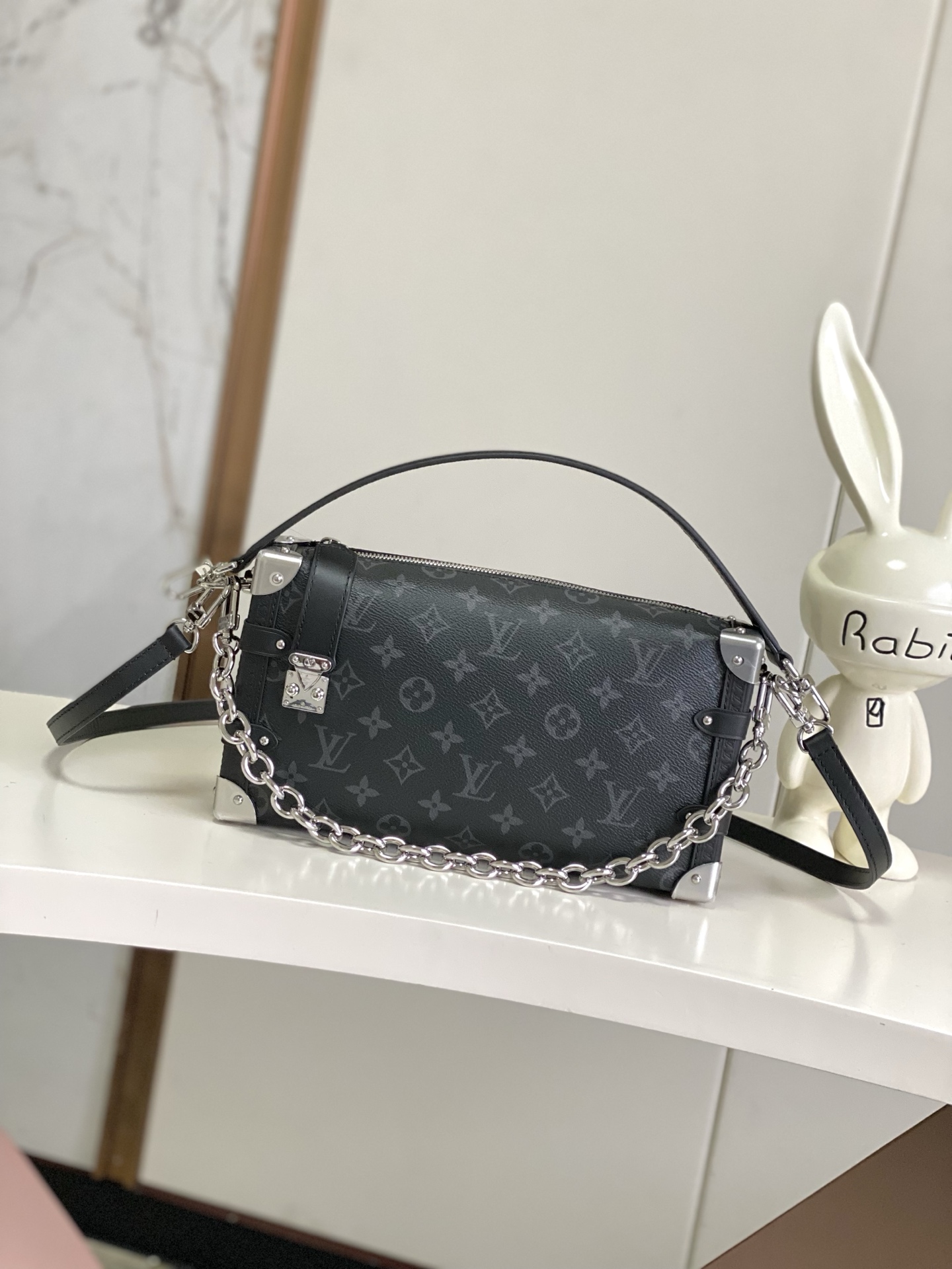 Louis Vuitton Monogram Eclipse Side Trunk East West Bag - Stylish and Compact