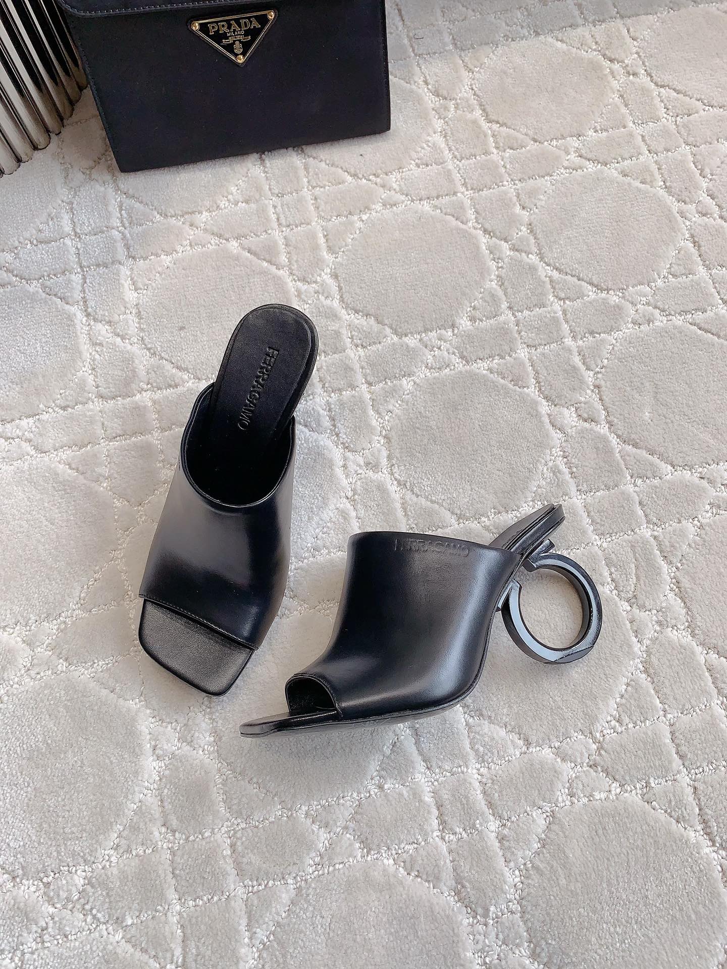 Ferragamo’s Stylish 588 High-Heel Sandals with Signature Logo Heel.