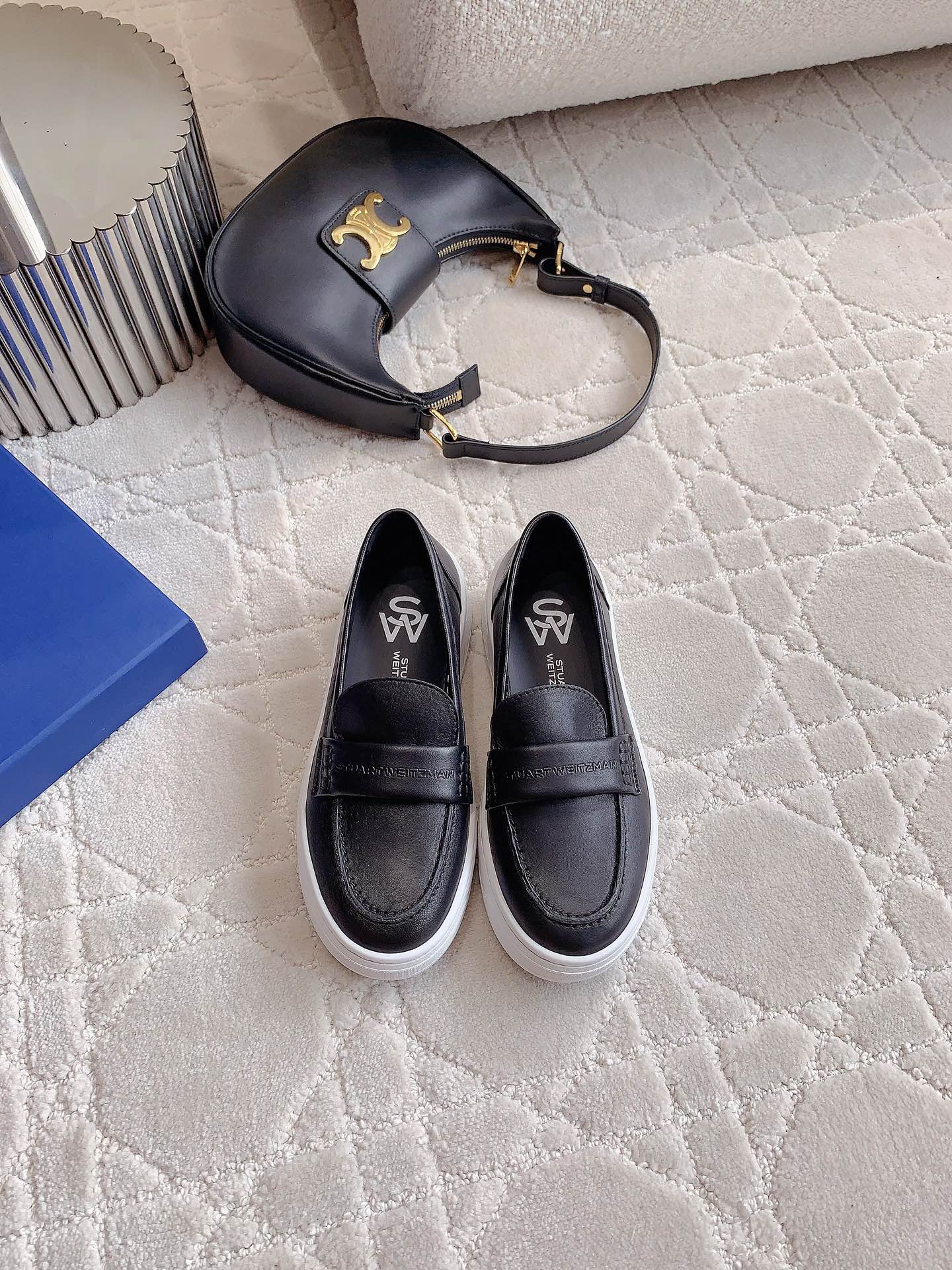 It’s worth 750. Stuart Weitzma’s new Happy Shoes. Shoe-skin, foot-skin inside