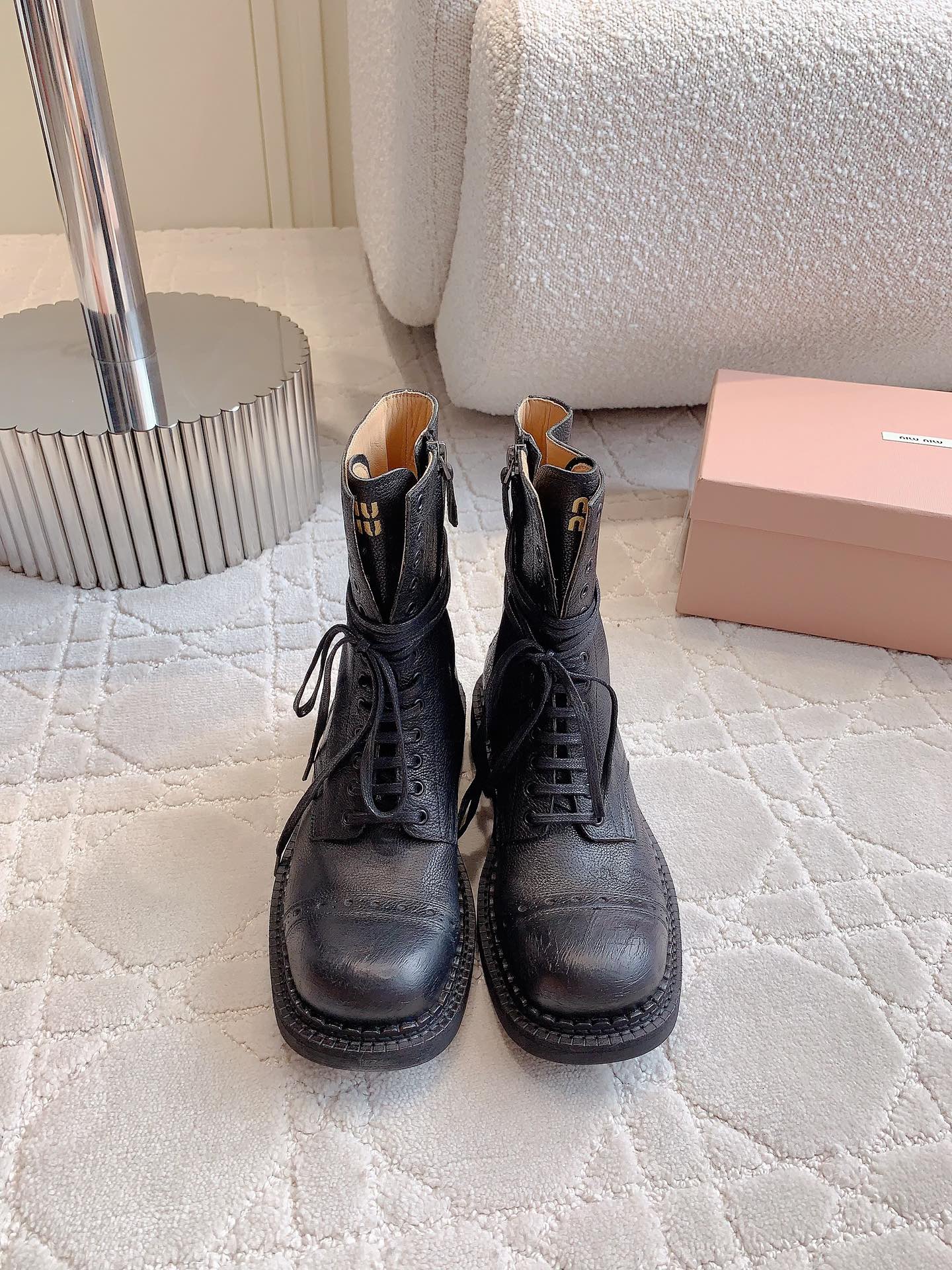 MiuMiu Botas cortas Piel de vaca Cuero