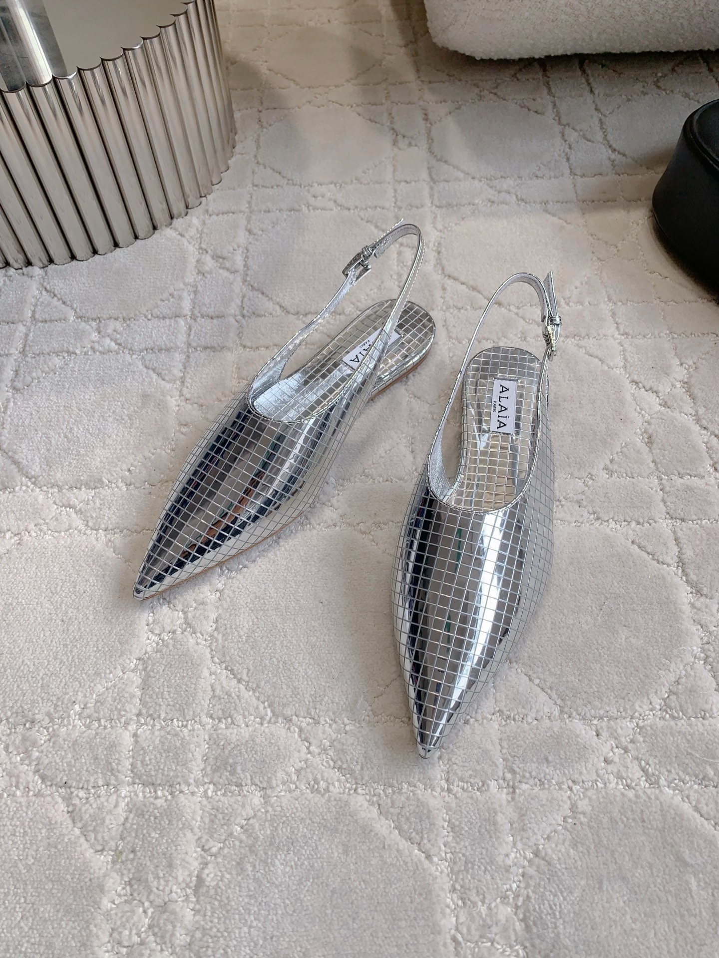 Alaia’s Futuristic Mirror Metal Flat Shoes: Price at 696. - 图片 3