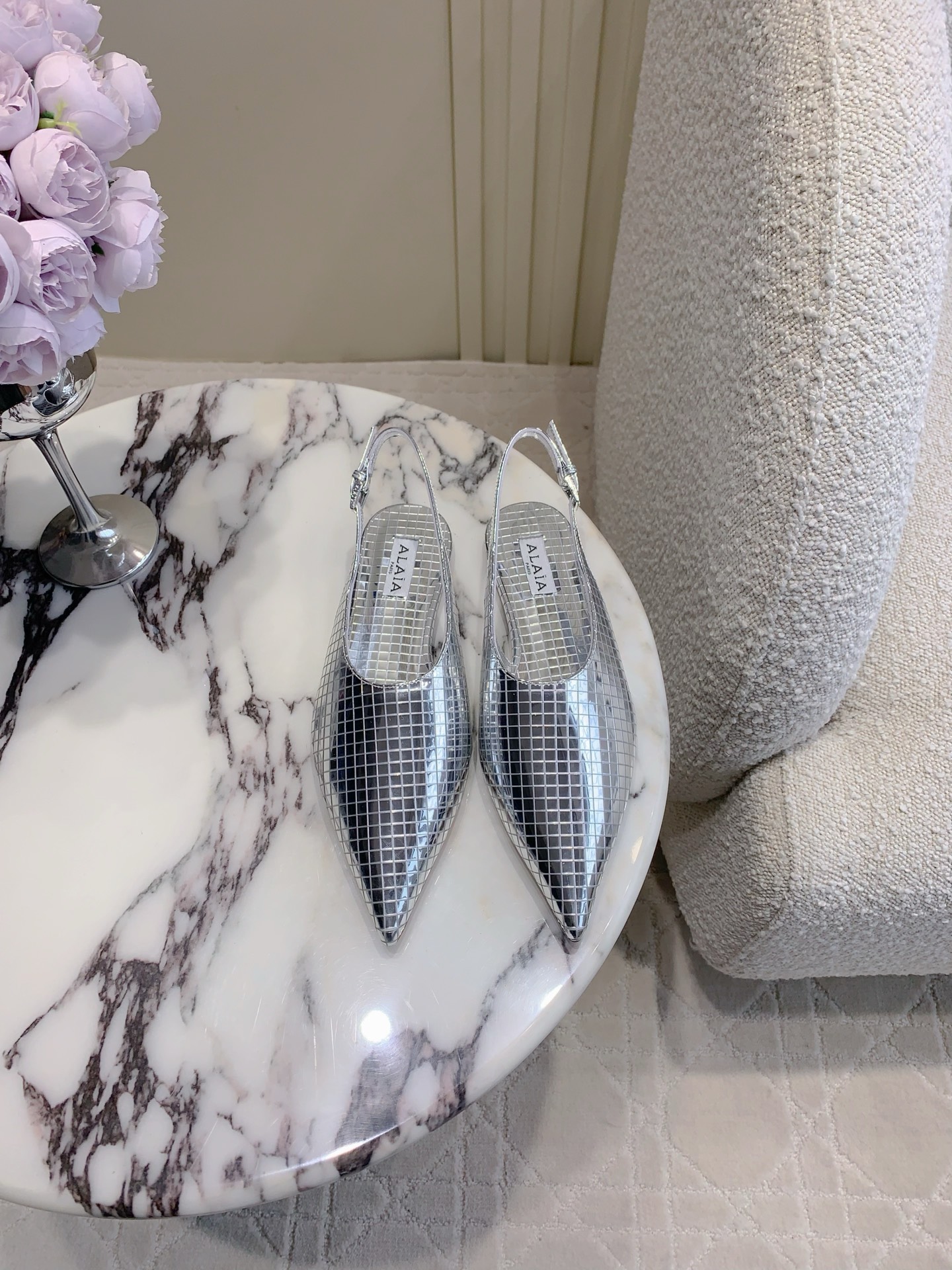 Alaia’s Futuristic Mirror Metal Flat Shoes: Price at 696. - 图片 1