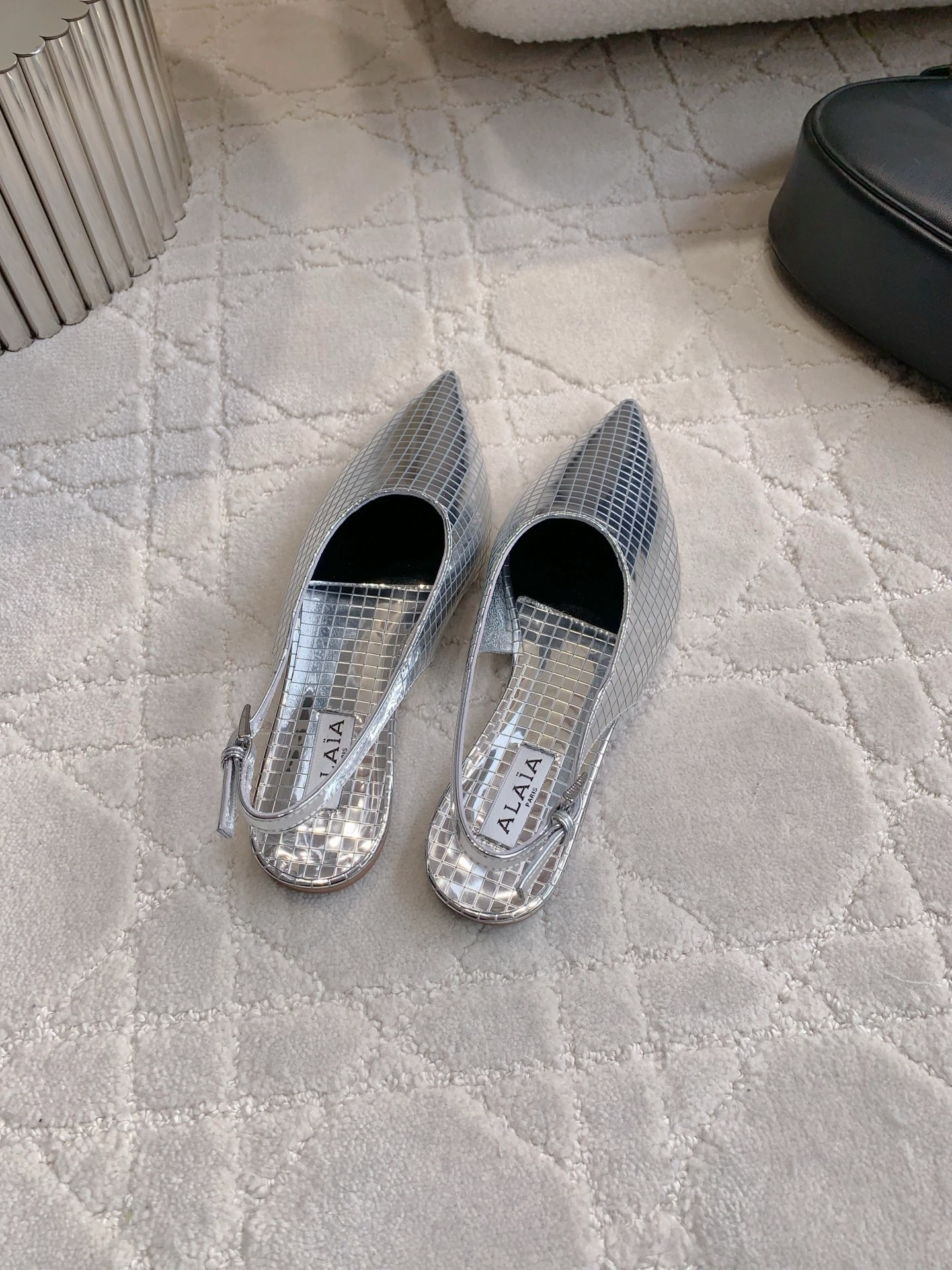 Alaia’s Futuristic Mirror Metal Flat Shoes: Price at 696. - 图片 8