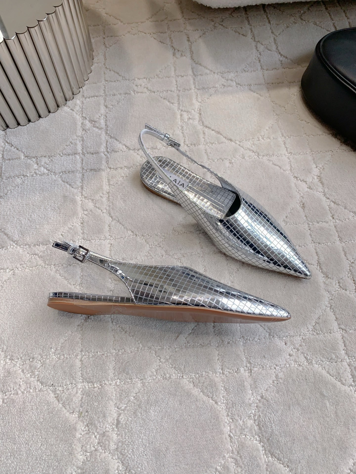 Alaia’s Futuristic Mirror Metal Flat Shoes: Price at 696. - 图片 4