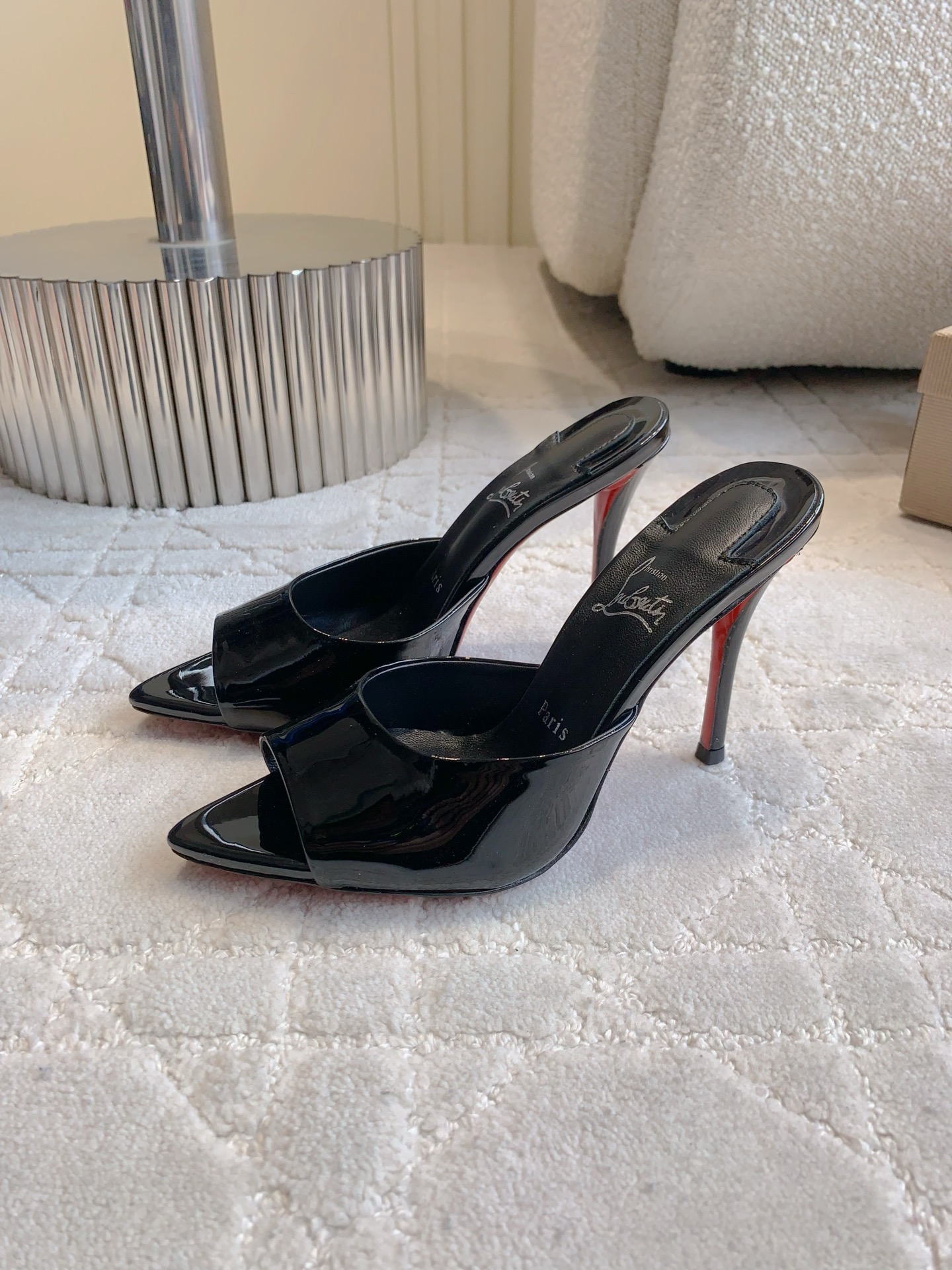 Christian Louboutin’s Sexy Fish-Sniffled Slipper with Curved Design and High Heel