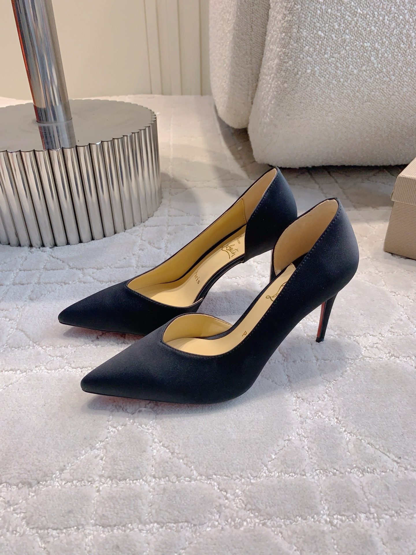 Christian Louboutin: Glamorous V-Mouth Heels with Skin Details