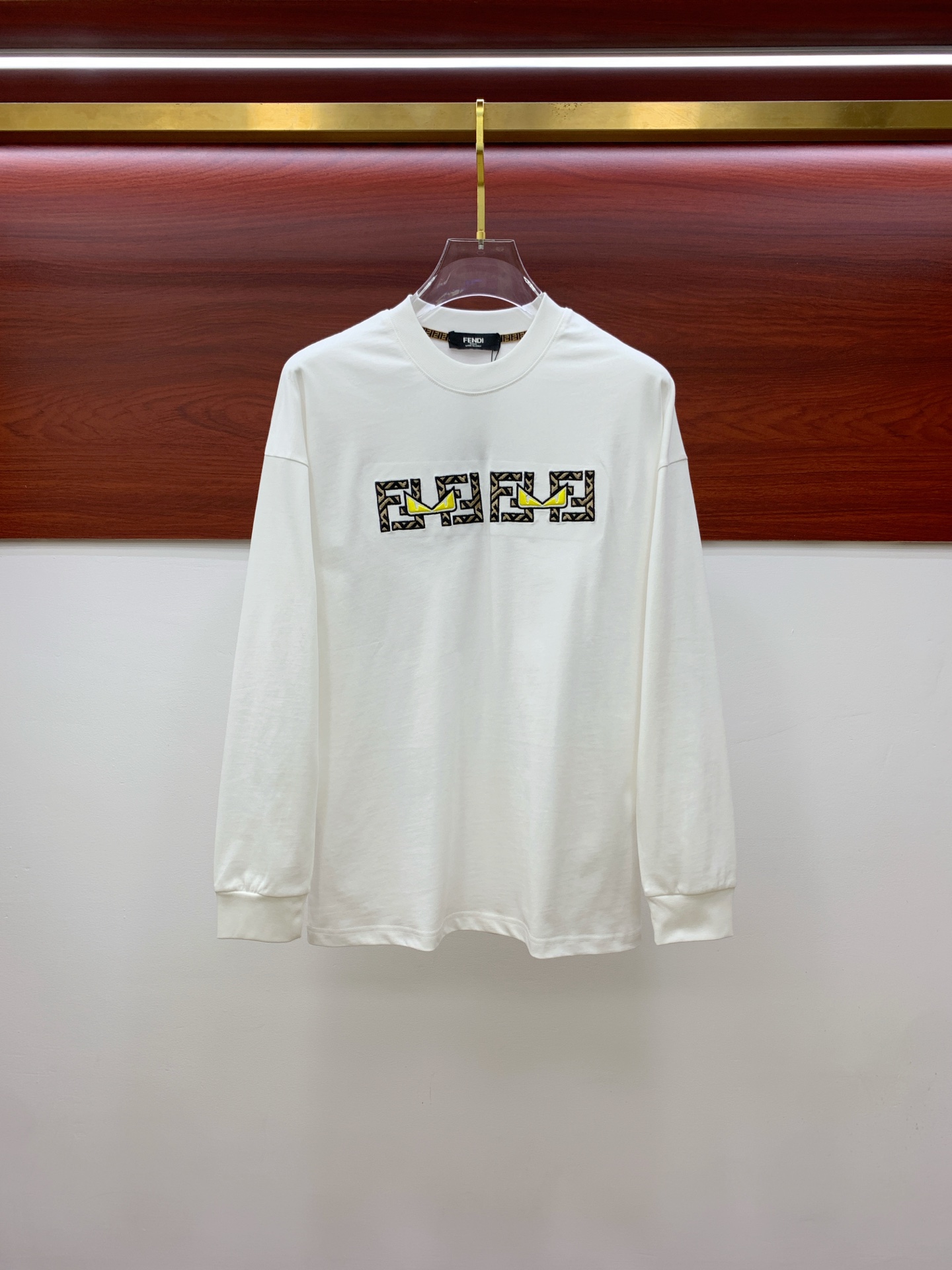Fendi White Long Sleeve T-Shirt with Monster Eyes Graphic, Casual Style