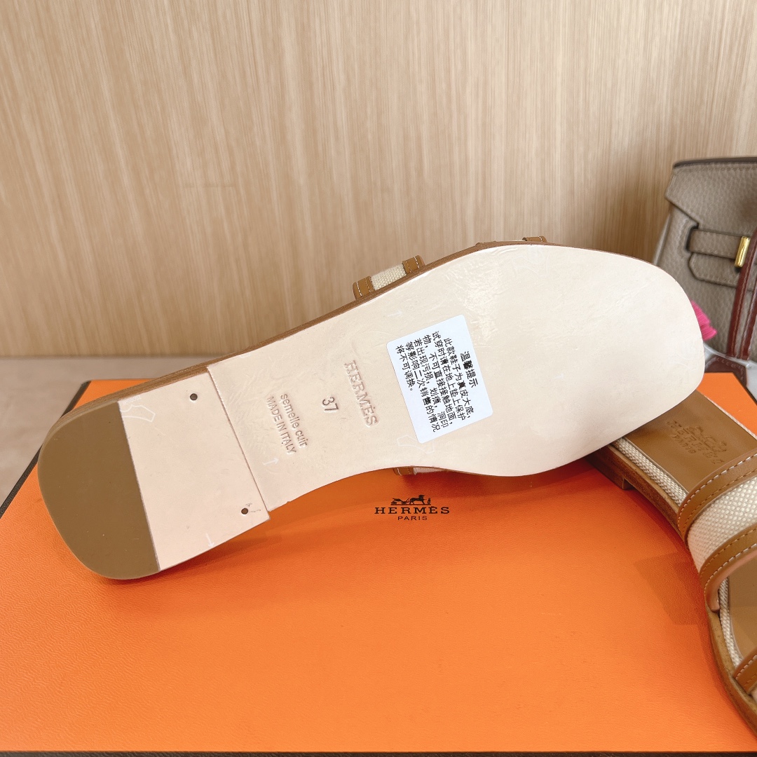 Hermes Oasis Sandal: Stylish Leather Slides with Iconic 'H' Cutout Design 10 i1726309837 2758 3