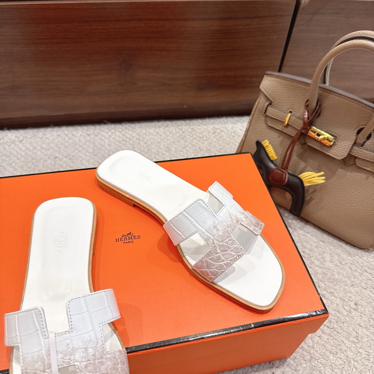Hermès Shoe Collection crafted with premium materials and signature 4